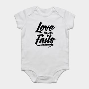 Love Never Fails Baby Bodysuit